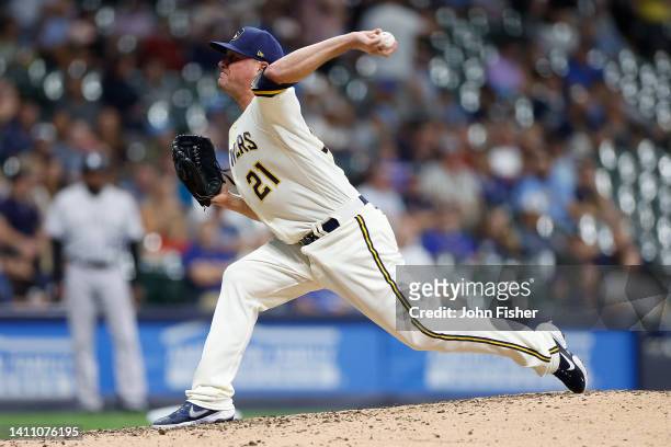 Jake McGee of the Milwaukee Brewers throws a pitch against the Colorado Rockies at American Family Field on July 25, 2022 in Milwaukee, Wisconsin.