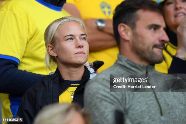 Pernille Harder of Chelsea, looks on as they watch the game from the stands during the UEFA Women's Euro 2022 Semi Final match between England and...