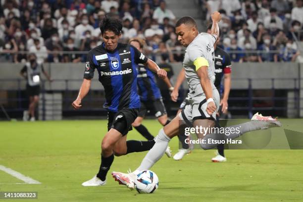 Kylian Mbappe of Paris Saint-Germain attempts a shot during the preseason friendly between Paris Saint-Germain and Gamba Osaka at Panasonic Stadium...