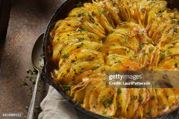 cheese and herb potato gratin - potato gratin stock pictures, royalty-free photos & images