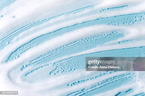 textured foam on blue background - beauty salon ukraine stock pictures, royalty-free photos & images