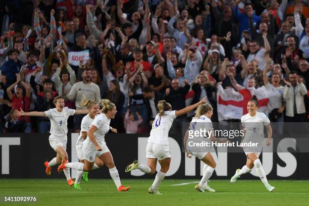Lucy Bronze of England celebrates scoring their side's second goal with teammates during the UEFA Women's Euro 2022 Semi Final match between England...