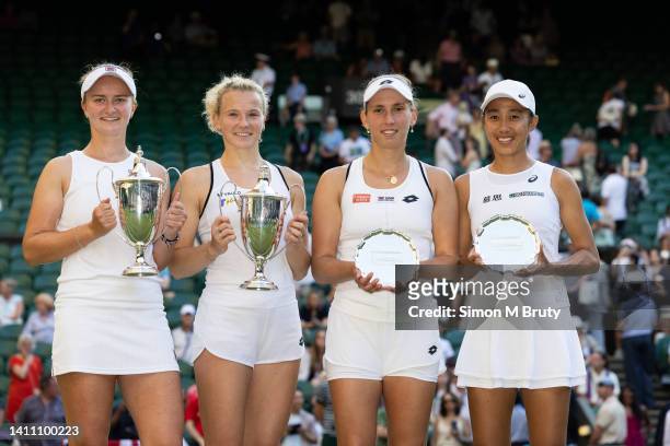 Barbora Krejcikova and Katerina Siniakova both of the Czech Republic with their trophies after winning the Ladies doubles after defeating Elise...