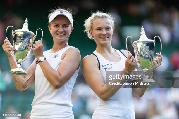 Barbora Krejcikova and Katerina Siniakova both of the Czech Republic celebrate with their trophies after winning the Ladies doubles after defeating...