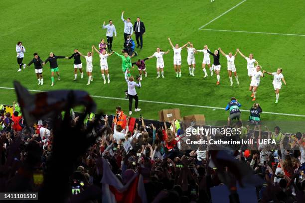 England players celebrate with the fans after their sides victory during the UEFA Women's Euro 2022 Semi Final match between England and Sweden at...