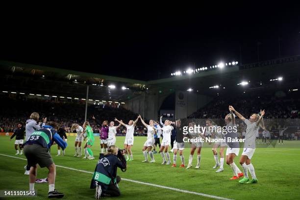 Players of England celebrate in front of their fans as they celebrate their side's win after the final whistle of the UEFA Women's Euro 2022 Semi...