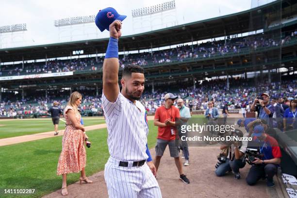 Willson Contreras of the Chicago Cubs waves as he heads to the clubhouse following his team's win over the Pittsburgh Pirates at Wrigley Field on...