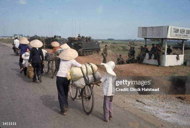 South Vietnamese flee Saigon April 1975 with the help of the U.S. Military. American involvement in the Vietnam War came to an end when troops from...