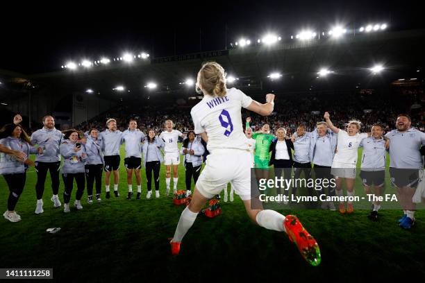 Ellen White of England celebrates in the middle of the team huddle following victory in the UEFA Women's Euro 2022 Semi Final match between England...