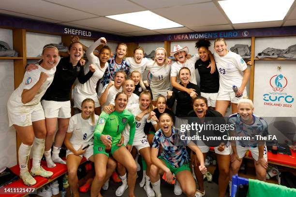 England players celebrate in the dressing room after their sides victory in the UEFA Women's Euro 2022 Semi Final match between England and Sweden at...