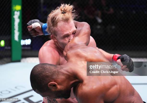 Acacio Dos Santos of Brazil punches Anton Turkalj of Sweden in a light heavyweight fight during Dana White's Contender Series Season 6 Week 1 at UFC...