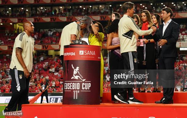 Rui Costa of SL Benfica greets Roger Schmidt of SL Benfica on the podium at the end of the Eusebio Cup match between SL Benfica and Newcastle United...