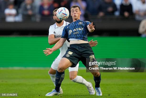 Federico Viñas of Club America plays the ball off his chest against Nach of Real Madrid in the first half during the Soccer Champions Tour 22 a...