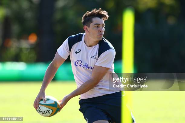 Jock Campbell passes during an Australian Wallabies training session at Royal Pines Resort on July 27, 2022 in Gold Coast, Australia.