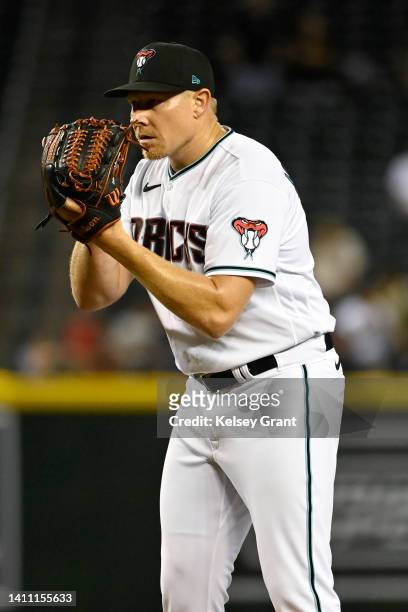 Mark Melancon of the Arizona Diamondbacks pitches against the San Francisco Giants during the ninth inning of the MLB game at Chase Field on July 26,...