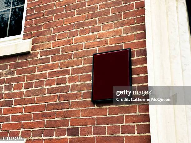 blank sign outside generic brick building - generic safety sign stock pictures, royalty-free photos & images
