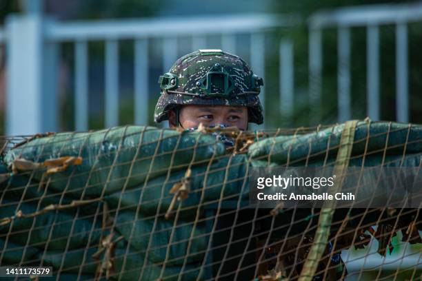 Taiwanese soldier secures a perimeter during the Han Kuang military exercise, which simulates China's People's Liberation Army invading the island on...