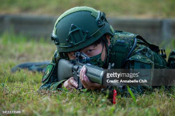 Taiwanese soldier aims with a rifle during the Han Kuang military exercise, which simulates China's People's Liberation Army invading the island on...