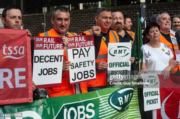 Striking members of the RMT and TSSA trade unions join the picket line at Euston station on July 27, 2022 in London, United Kingdom. Around 40,000...