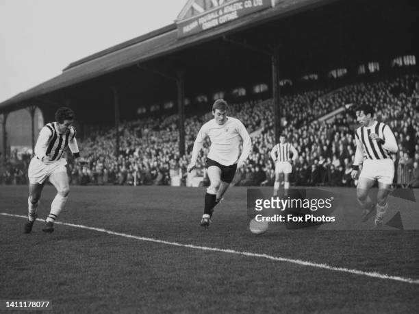 Rodney Marsh, Forward for Fulham Football Club runs into the box with the football during the English League Division 1 match against West Bromwich...