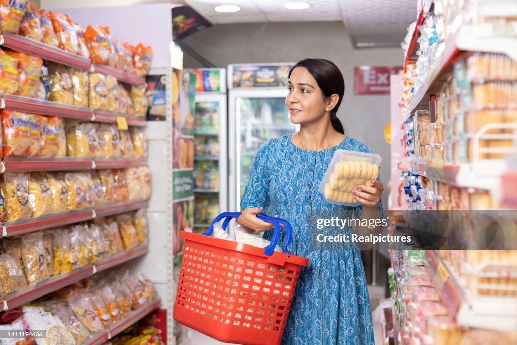 Indian woman shopping at grocery store