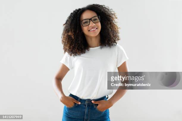 studio shot of young woman - blank t shirt model stock pictures, royalty-free photos & images