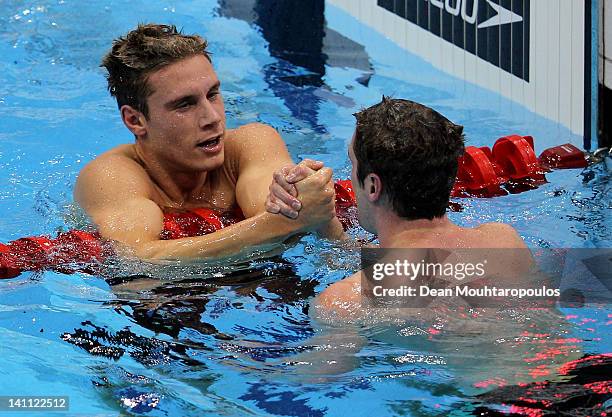 Daniel Fogg of Loughborough University celebrates with David Davies of City of Cardiff after competing in the Men's 1500m Freestyle Final during day...