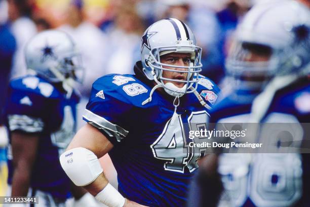 Daryl Johnston, Running Back for the Dallas Cowboys looks on during the National Football Conference East Division game against the Washington...