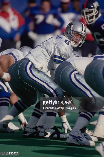 Troy Aikman, Quarterback for the Dallas Cowboys calls the play at the line of scrimmage during the National Football Conference East Division game...