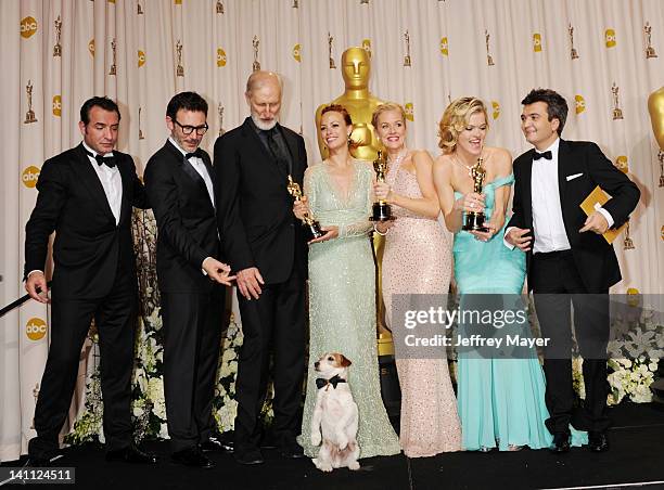 Jean Dujardin, Michel Hazanavicius, James Cromwell, Uggie the dog, Berenice Bejo, Penelope Ann Miller, Missi Pyle and Thomas Langmann pose in the...