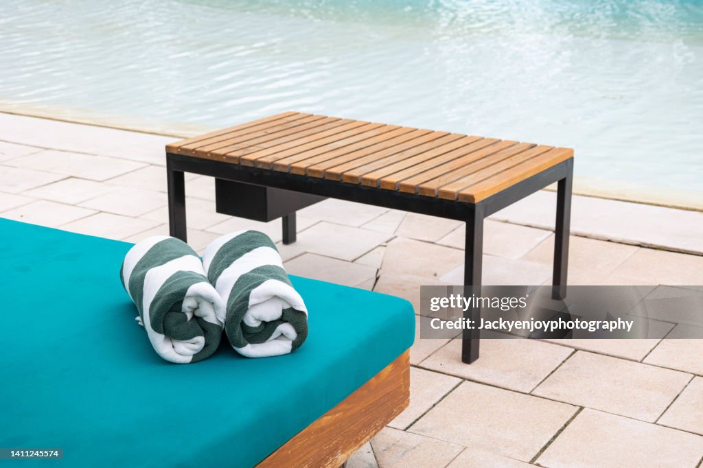 Towels on sun loungers by the pool