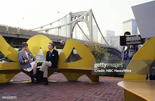 Most Livable Cities Tour 1987" -- Pictured: NBC News' Jane Pauley, children's tv host Fred Rogers on the North Shore in Pittsburgh, Pennsylvania on...