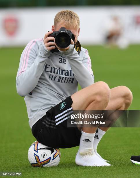 Aaron Ramsdale of Arsenal takes some pictures during the pre season friendly between Arsenal and Brentford at London Colney on July 27, 2022 in St...