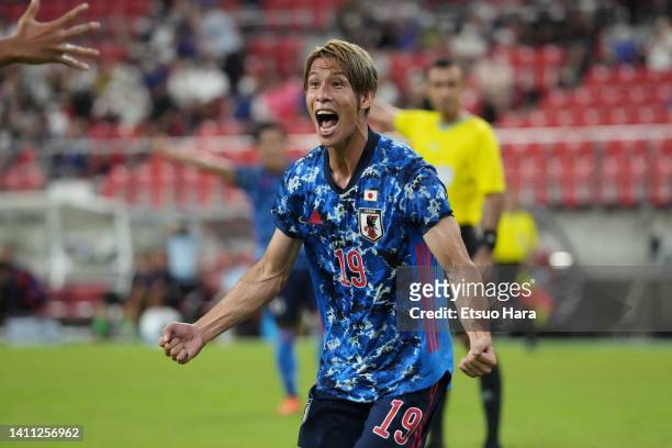 Sho Sakai of Japan celebrates scoring his side's second goal during the EAFF E-1 Football Championship match between Japan and South Korea at Toyota...