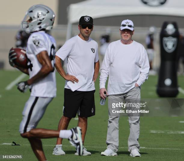 General manager Dave Ziegler and owner and managing general partner Mark Davis of the Las Vegas Raiders look on during the team's first fully padded...