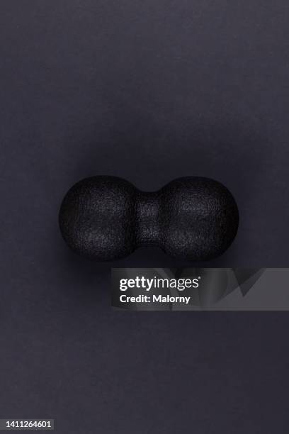 blackroll on black background. - blackroll stock pictures, royalty-free photos & images