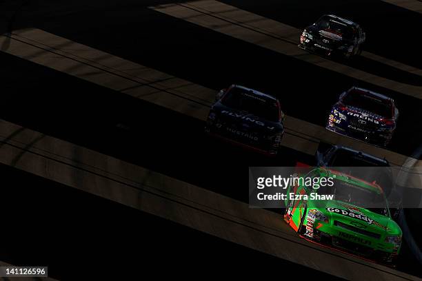 Danica Patrick, driver of the GoDaddy.com Chevrolet, leads a group of cars during the NASCAR Nationwide Series Sam's Town 300 at Las Vegas Motor...