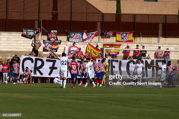 Fans of Atletico de Madrid display a sign against Cristiano Ronaldo during the pre-season friendly match between Numancia and Atletico de Madrid at...