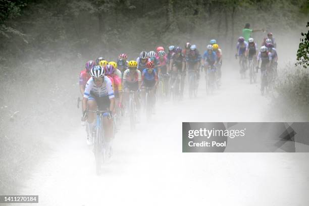 Ellen Van Dijk of Netherlands and Team Trek- Segafredo and Marlen Reusser of Switzerland and Team SD Worx lead the peloton through a gravel road...