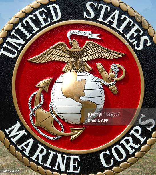 The US Marine Corps logo is seen March 9th at the US Marine Corps Base Quantico shortly before USMC officials deliver a briefing on the Active Denial...