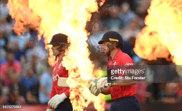 England batsmen Jos Buttler and Jason Roy come out through the flames to bat during the 1st Vitality IT20 match between England and South Africa at...