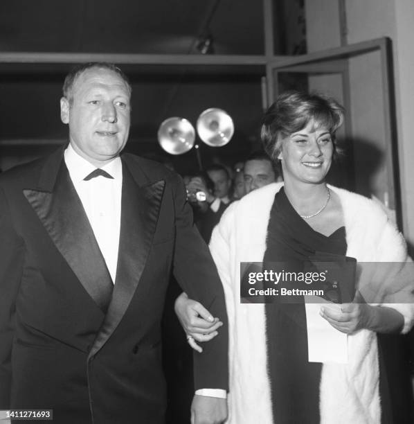 Stars of the film "Such A Lone Absence," George Wilson and Alida Valli arrive at the Cannes Festival Palace for the presentation of the French film...