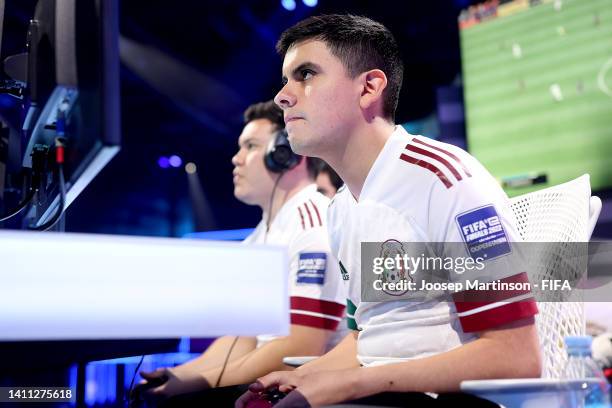 Heber Cardenas Gonzalez of Mexico; Joksan Redona of Mexico and Luis Manuel Ramirez Hernandez of Mexico looks on during Group Stage D match between...