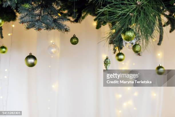 part of a decorated christmas tree. new year. christmas. christmas decor. christmas tree. christmas background. holiday. - alo house winter - fotografias e filmes do acervo