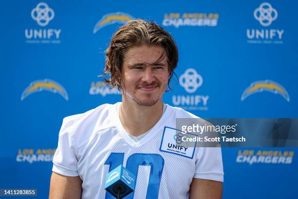 Justin Herbert of the Los Angeles Charger speaks with the media during training camp at Jack Hammett Sports Complex on July 27, 2022 in Costa Mesa,...