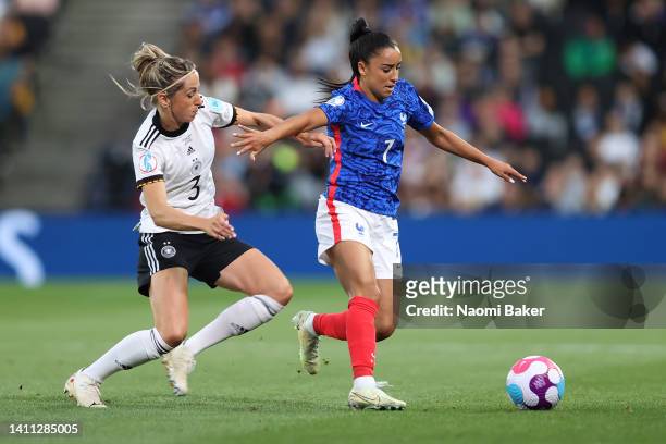 Sakina Karchaoui of France is challenged by Kathrin-Julia Hendrich of Germany during the UEFA Women's Euro 2022 Semi Final match between Germany and...