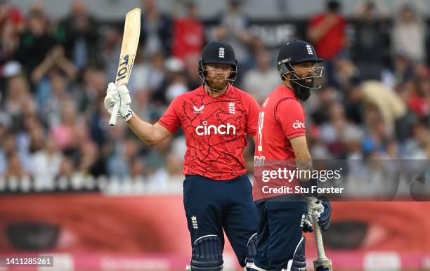 England batsman Jonny Bairstow reaches his 50 as Moeen Ali looks on during the 1st Vitality IT20 match between England and South Africa at Seat...