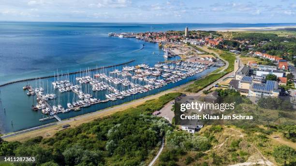 aerial view over terschelling island in the waddensea at the netherlands - friesland netherlands stock pictures, royalty-free photos & images