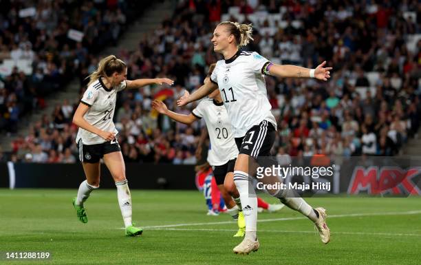 Alexandra Popp of Germany celebrates after scoring her teams first goal during the UEFA Women's Euro 2022 Semi Final match between Germany and France...