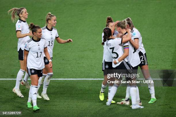 Alexandra Popp of Germany celebrates scoring their side's first goal with teammates during the UEFA Women's Euro 2022 Semi Final match between...